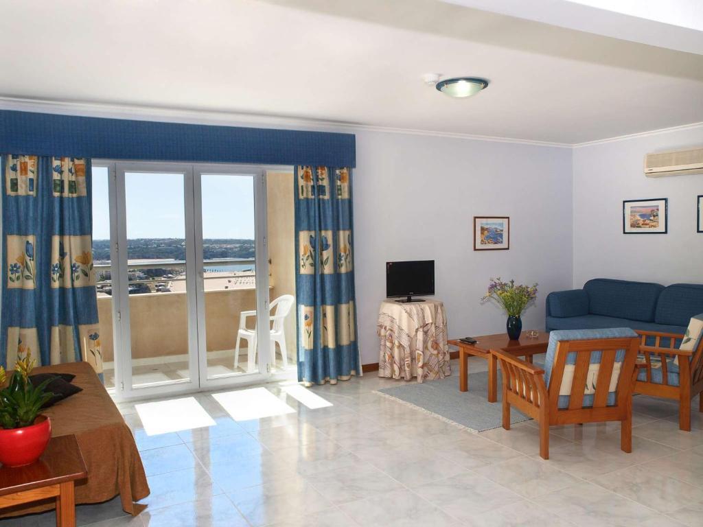 Apartamentos Jardins Da Rocha ปอร์ติเมา ห้อง รูปภาพ